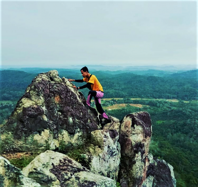 Menikmati Keindahan Kota Jambi dari atas Bukit Ngarau Merangin